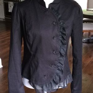 Black jacket with cute ruffle detailing by button
